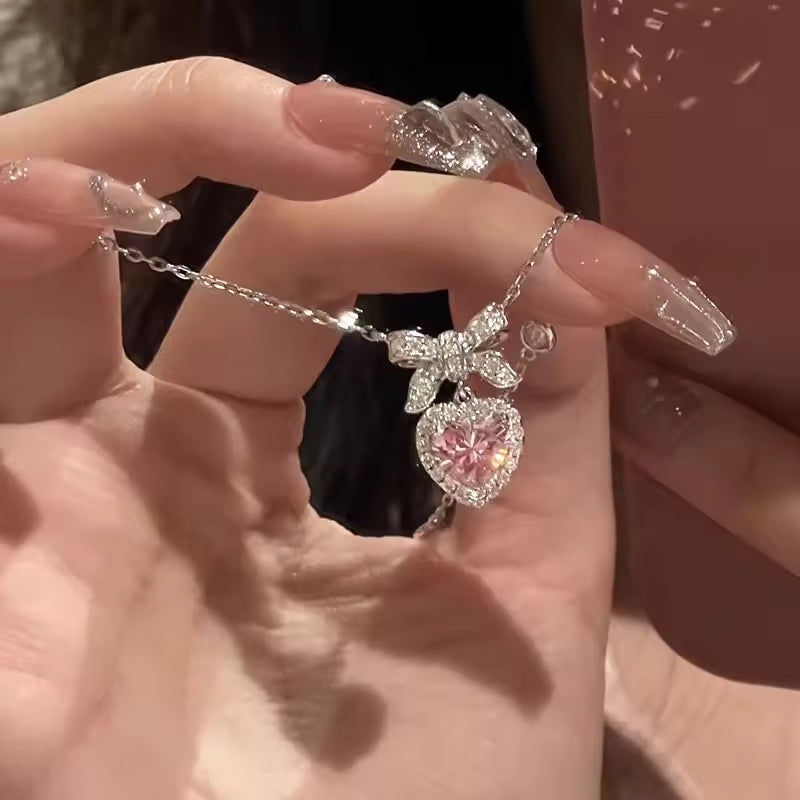 Collar Corazón Cristal Rosa con Lazo – Cadena Plateada Mujer